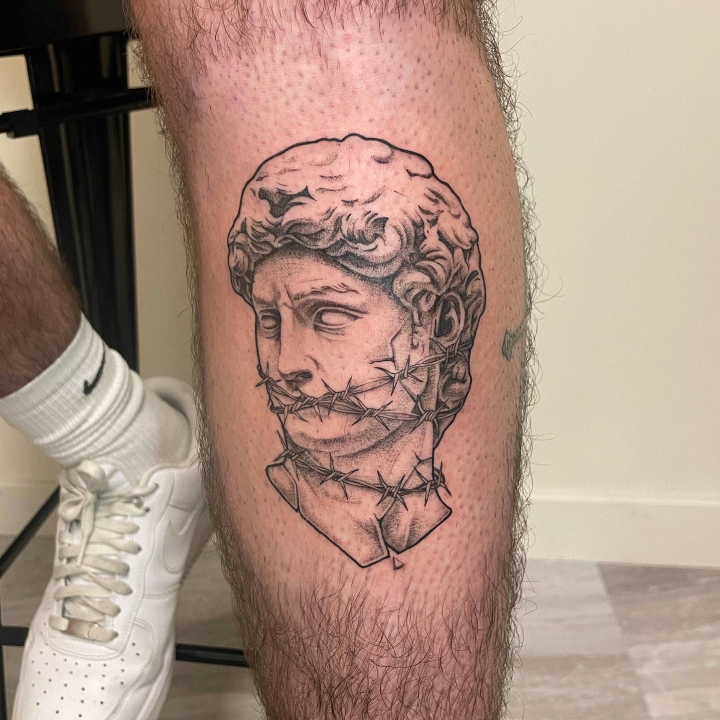 David statue black and gray tattoo