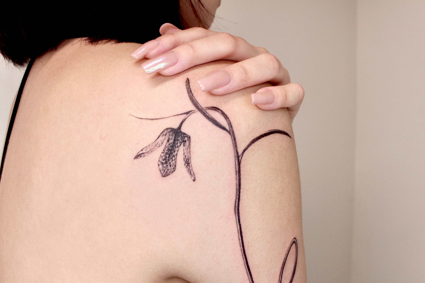 Long sleeve line and flower tattoo