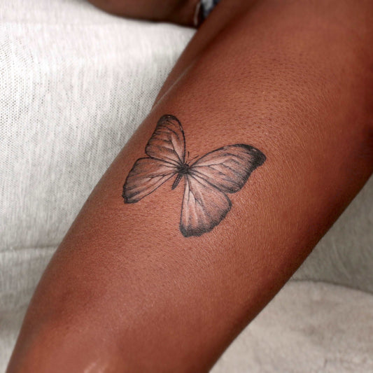 Butterfly tattoo by gtattoovan
