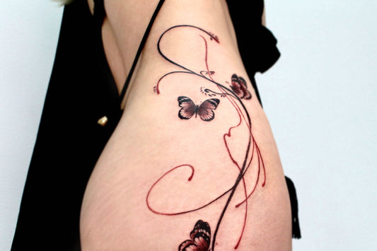 Butterfly flow line tattoo gtattoovan