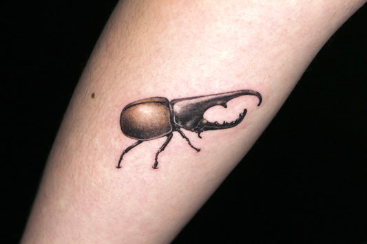 Hercules beetle realism tattoo